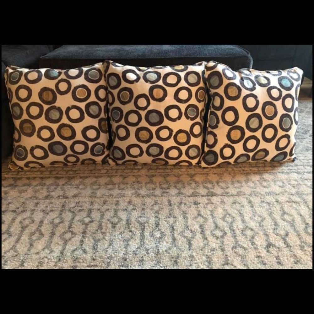 Three square pillows
